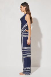 Sleeveless bias top with handcrafted placement print, cowled neckline, handkerchief hemline, and centre-back keyhole