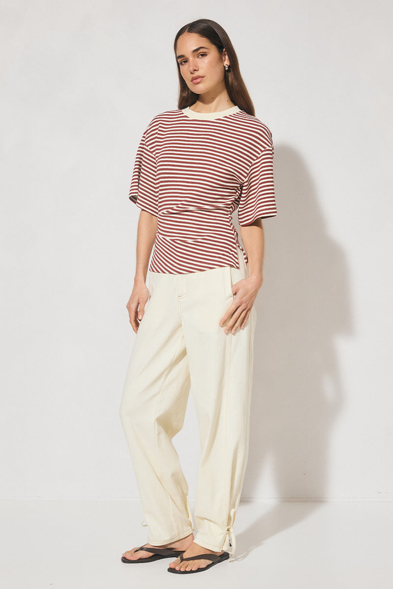 Striped bonded knit oversized women’s tee shirt with cinched waist, side splits, wide sleeves, and crew neckline