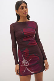 Long sleeve mesh mini dress with handcrafted placement print, boat neckline, sheer sleeves and fitted silhouette