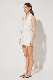 Embroidered halter mini dress with macramé waist belt and A-line silhouette