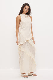 Sleeveless longline top in brushed cupro satin with narrow cowl neckline and asymmetric spiral flounce hem