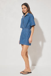 Short-sleeved denim mini dress with cornelli piping, blouson shirt-style bodice, gathered waist, and skimming mini skirt