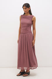 Sleeveless flocked polka dot mesh midi dress with ruched bodice, dropped waist, and fit and flare silhouette