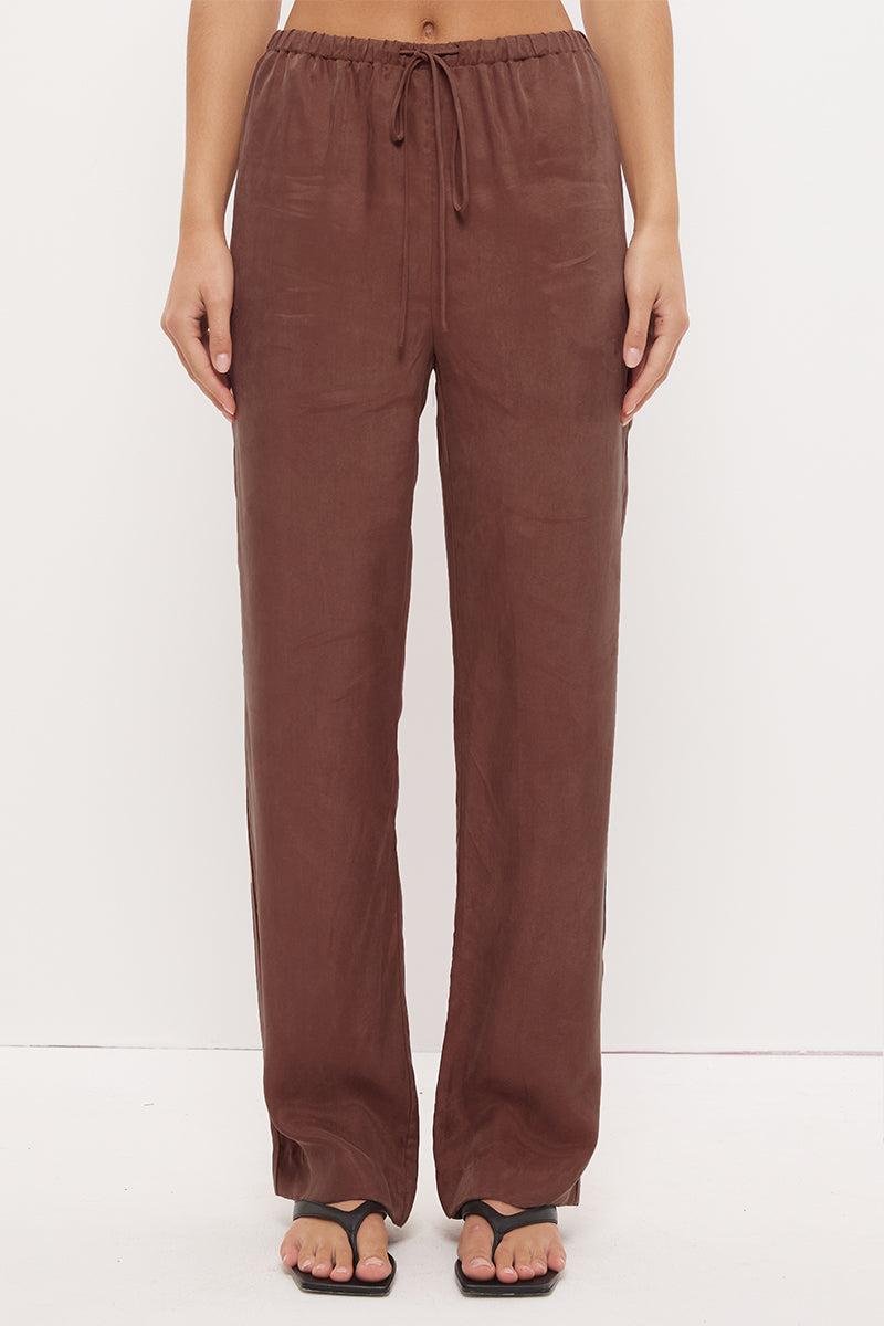 Mid-rise relaxed fit straight leg pants in brushed woven fabric with exclusive handcrafted print