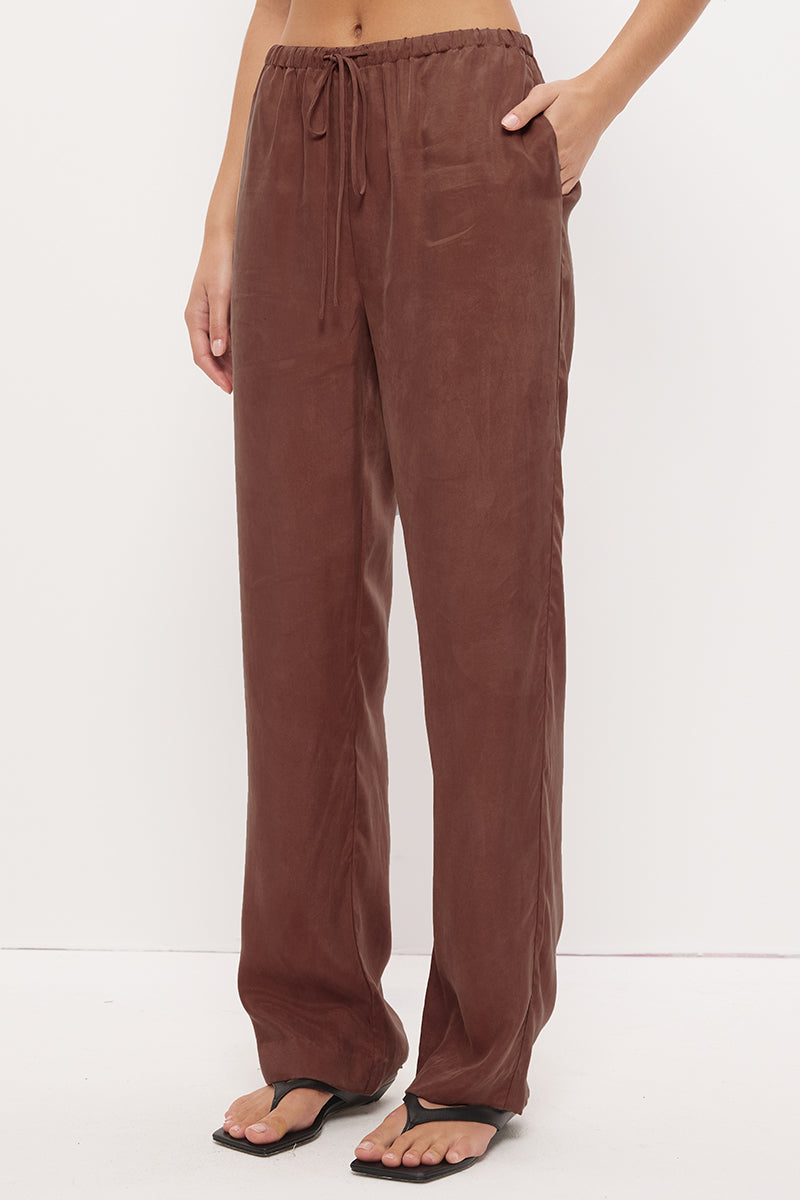 Mid-rise relaxed fit straight leg pants in brushed woven fabric with exclusive handcrafted print