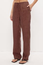 Mid-rise relaxed fit straight leg pants in brushed woven fabric with exclusive handcrafted print