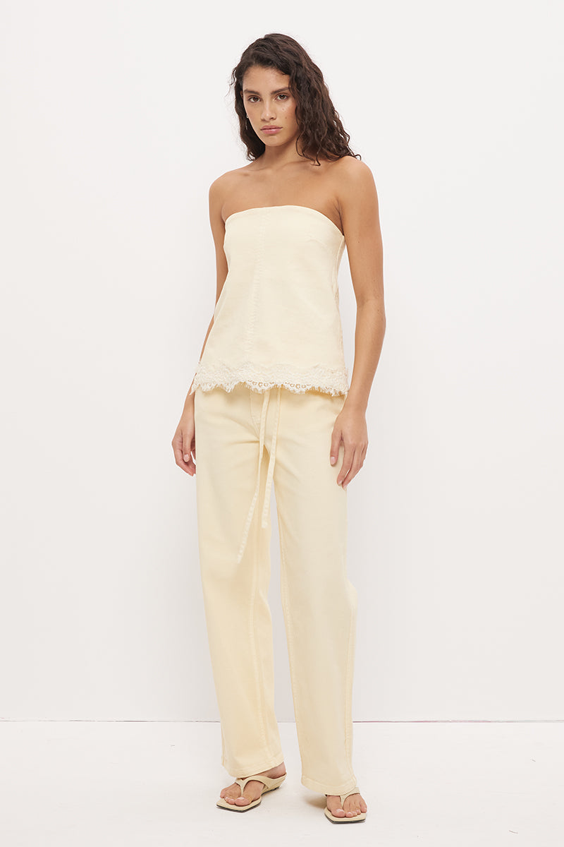 Strapless denim top with A-line silhouette and scallop lace trim hemline