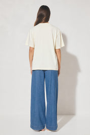  Oversized cotton jersey T-shirt with round neckline and cornelli appliqué detail, designed in Australia