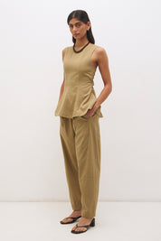 Sleeveless cotton twill top with fit and flare silhouette, open back tie detail and circle cut hem