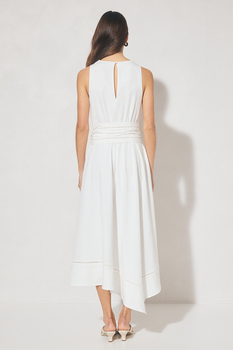 Sleeveless textured woven fit and flare midi dress with cowled neckline, ladder trim hem, handkerchief skirt, and waist sash