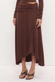Printed asymmetrical midi skirt with gathered waistband, draped hi-lo hem, and front split in stretch modal jersey