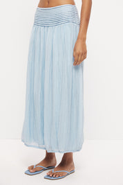 High waisted midi skirt in semi-sheer crinkle woven fabric with pinstitched waistband and tulip hem