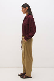 Cotton twill bomber jacket with balloon sleeves, patch pockets, drawcord hem and relaxed fit silhouette