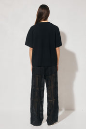 Oversized knitted tee shirt with round neckline and ribbed neck band in soft viscose-blend knit