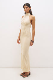 Knitted halter neck maxi dress with floral appliqué, turtleneck band, bodycon bodice and fit and flare skirt