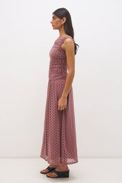 Sleeveless flocked polka dot mesh midi dress with ruched bodice, dropped waist, and fit and flare silhouette