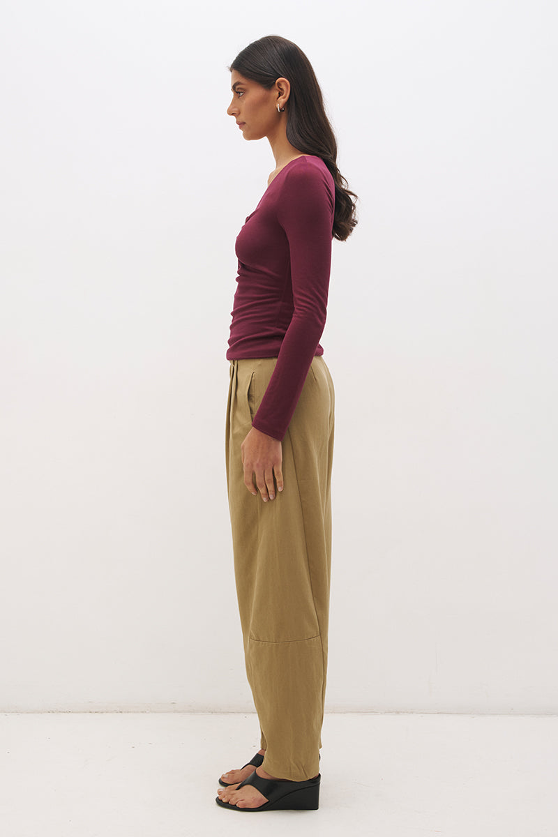 Long sleeve jersey top with plunging V neckline, spiral ring detail and ruched front in a skimming fit