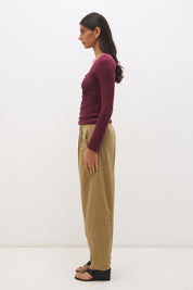 Long sleeve jersey top with plunging V neckline, spiral ring detail and ruched front in a skimming fit