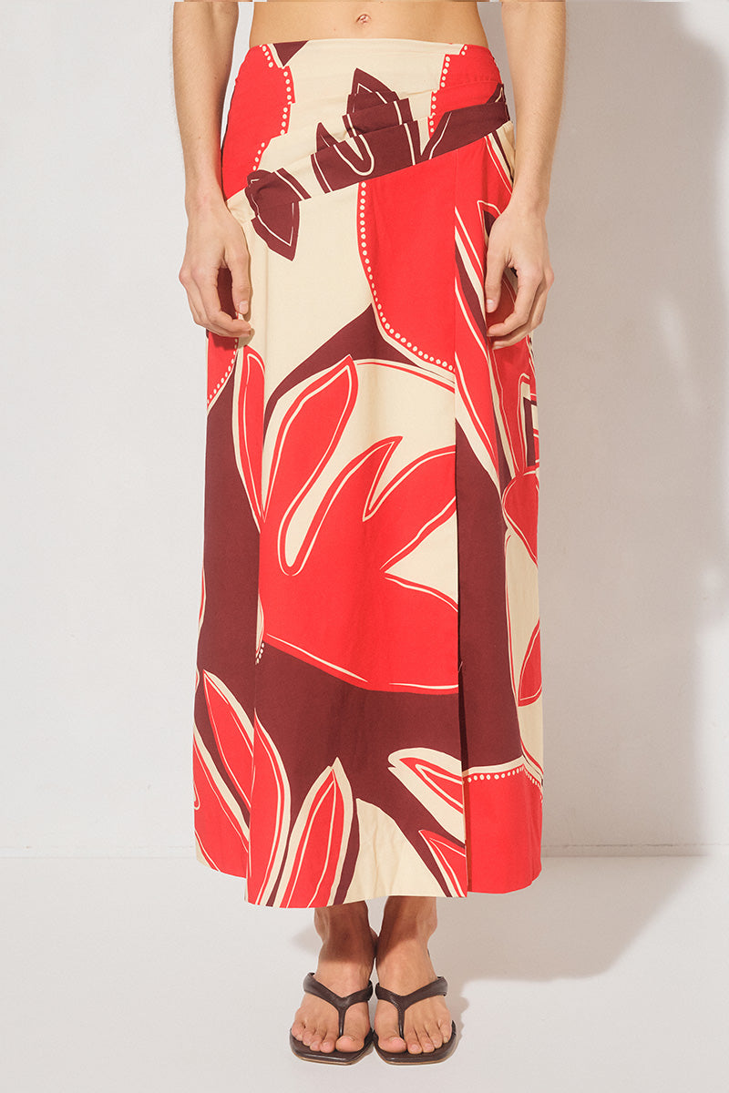 Maxi length cotton blend fit & flare skirt with draped asymmetrical waistband, angled tucks, side front split, and elasticated back panels