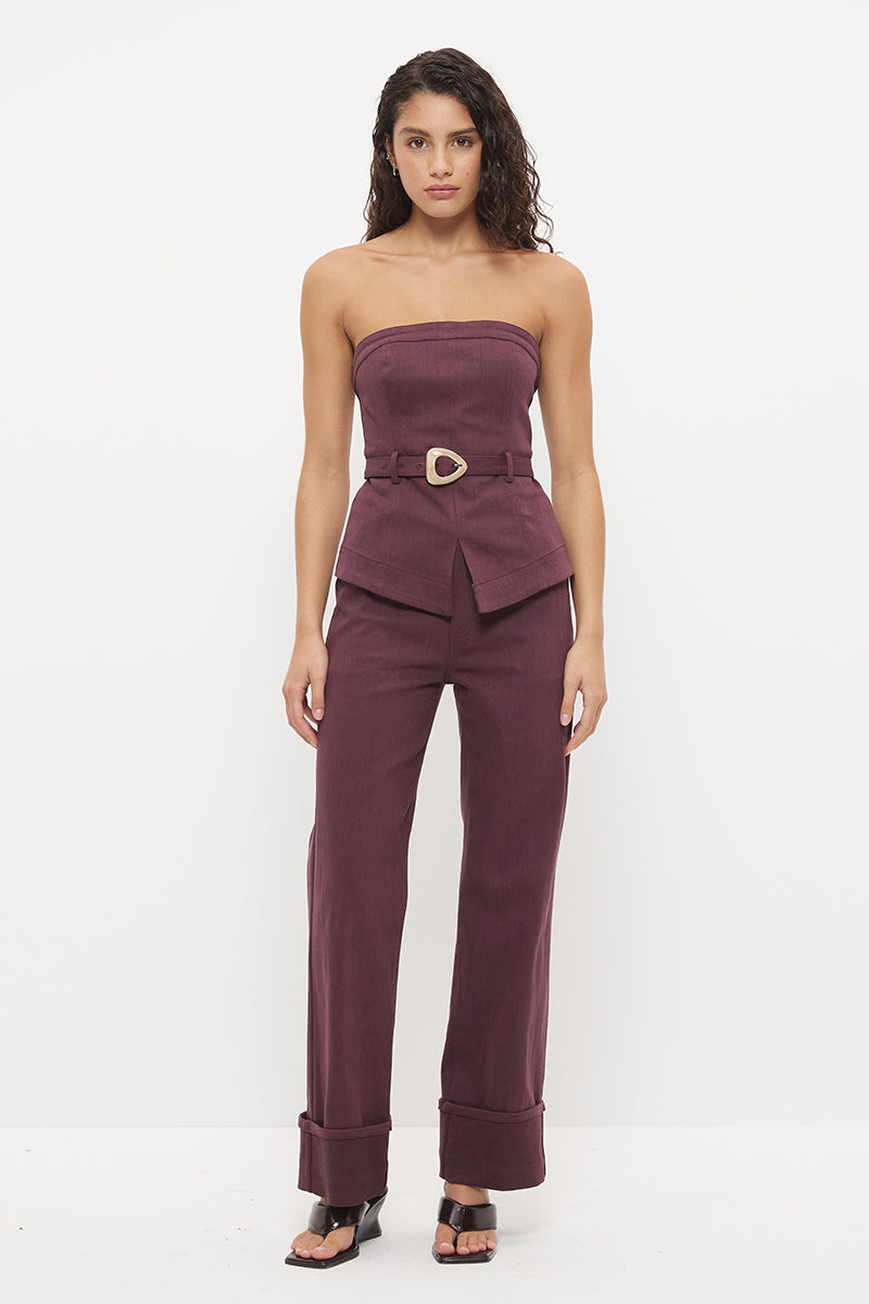 Mid-rise straight leg denim jeans with wide cuff hem and contrast buckle belt