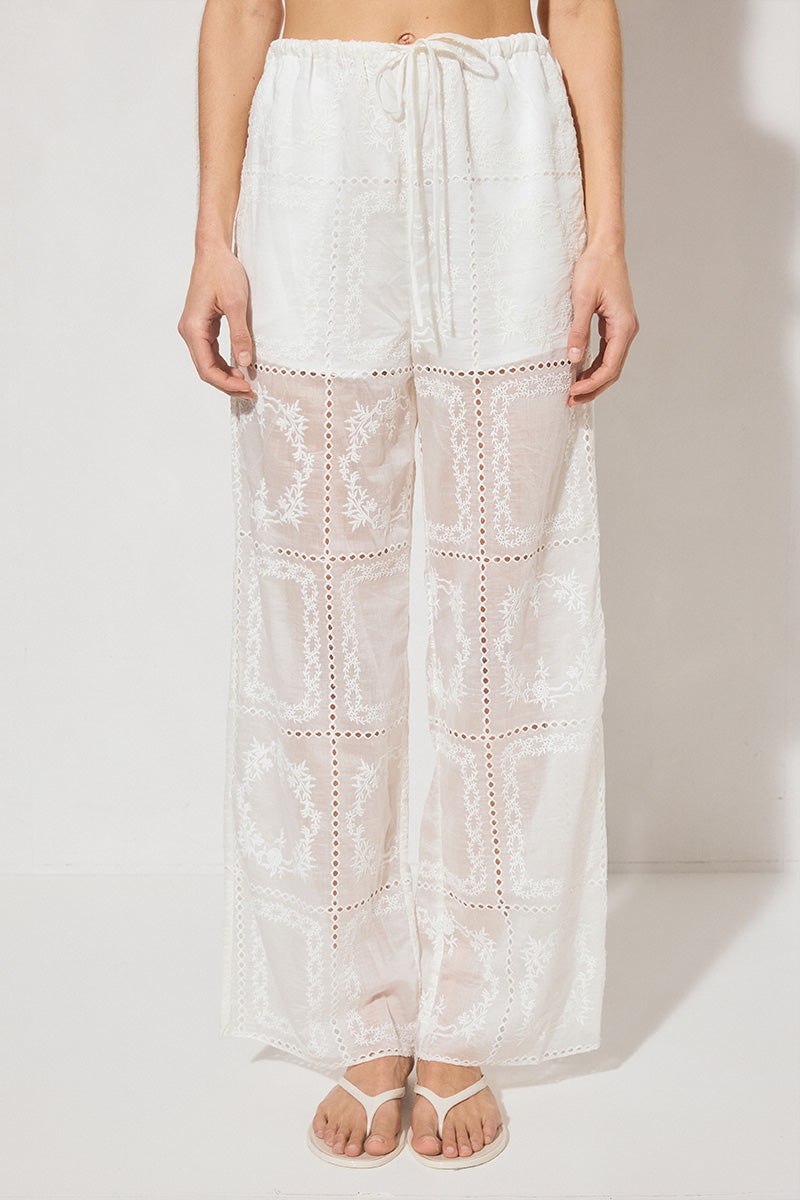 ELOWEN Relaxed Drawstring Pants in semi-sheer embroidered fabric with wide-leg silhouette, elasticated waist, drawcord, and side pockets