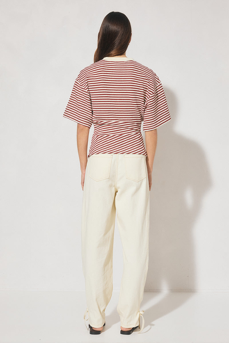 Striped bonded knit oversized women’s tee shirt with cinched waist, side splits, wide sleeves, and crew neckline