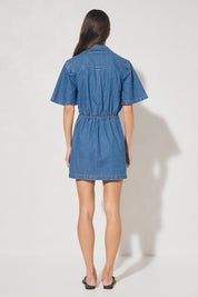 Short-sleeved denim mini dress with cornelli piping, blouson shirt-style bodice, gathered waist, and skimming mini skirt