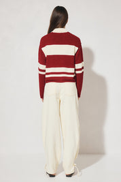 Bicolour collared knit jumper with oversized fit, dropped shoulder, V neckline, contrast polo-style collar and placket, long sleeves, and narrow rib hem finishes