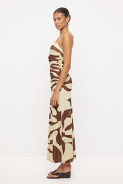 Strapless midi dress in stretchy mesh with fitted longline bodice, dropped waist and side split in exclusive handcrafted print
