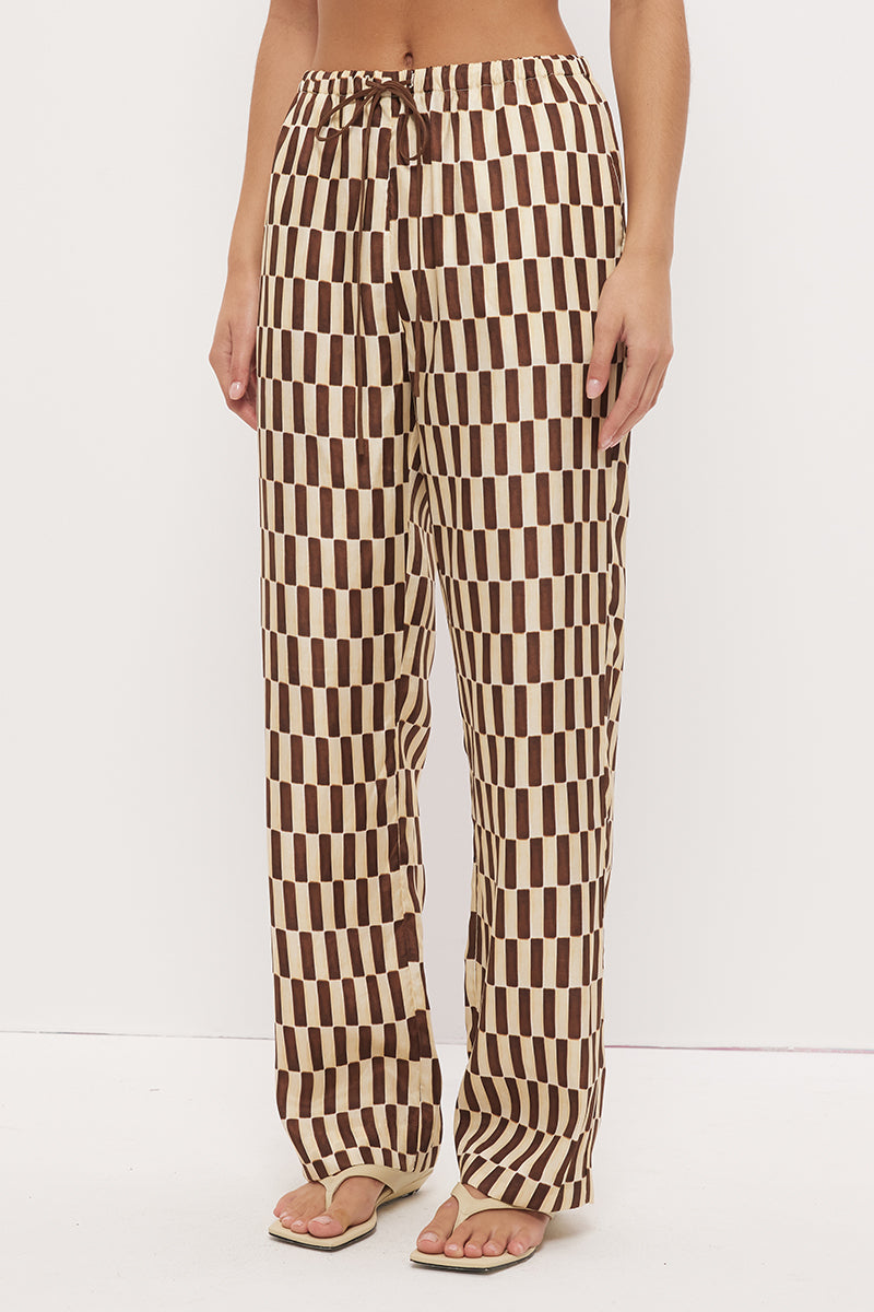 Mid-rise relaxed fit straight leg pants in brushed woven fabric with exclusive handcrafted print