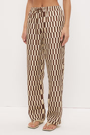 Mid-rise relaxed fit straight leg pants in brushed woven fabric with exclusive handcrafted print