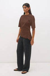 Cotton jersey tee with cinched waist, angled tuck detail, side splits and lace trim hem