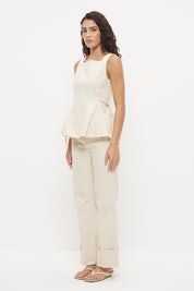 Sleeveless denim top with fit and flare silhouette, square neckline and circle cut flared hemline