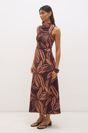 Sleeveless printed midi dress with fit and flare silhouette, funnel neckline, ruched bodice, and soft A-line skirt in stretch modal jersey