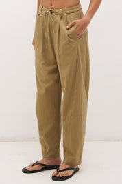 Cotton twill barrel leg pants with mid-rise fit, drawstring waist and structured panel detailing