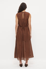 Sheer maxi dress with dropbeading embellishment and jewel neckline over separate slip
