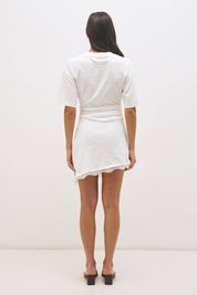 Cotton jersey tee mini dress with cinched waist, fitted skirt, side split and lace trim angled hem