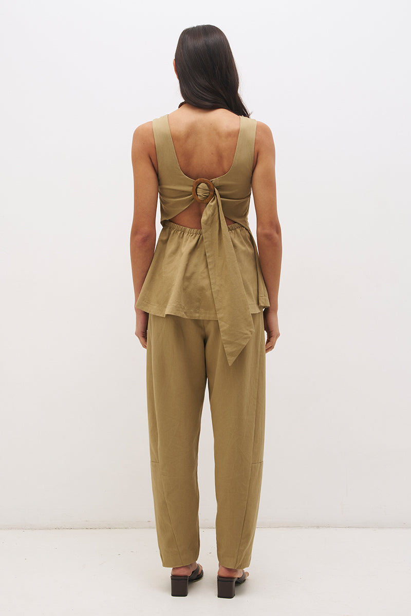 Sleeveless cotton twill top with fit and flare silhouette, open back tie detail and circle cut hem