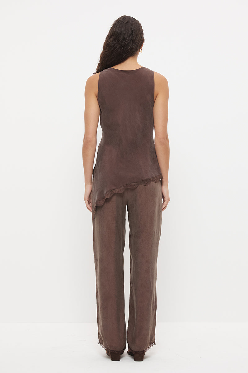 Sleeveless longline bias top with cowl neckline, scalloped lace hem and asymmetrical hem in silky cupro blend fabric