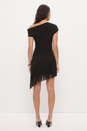 Off-shoulder mini dress in stretch knit crepe with asymmetrical neckline and angled fringe hem detail