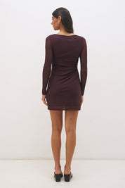 Long sleeve mesh mini dress with handcrafted placement print, boat neckline, sheer sleeves and fitted silhouette
