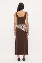 Sleeveless maxi dress with boat neckline, contrast printed sash and macrame tassel detail