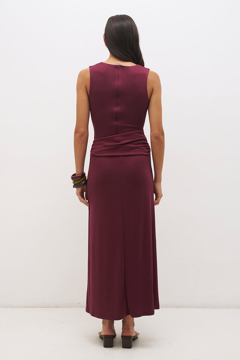Sleeveless jersey maxi dress with cowl neckline, spiral ring detail, ruched bodice and fit and flare silhouette