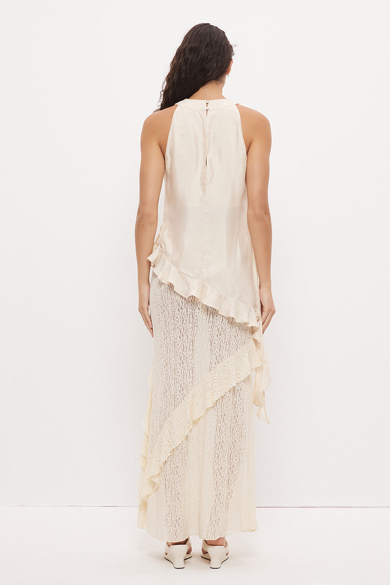 Sleeveless longline top in brushed cupro satin with narrow cowl neckline and asymmetric spiral flounce hem