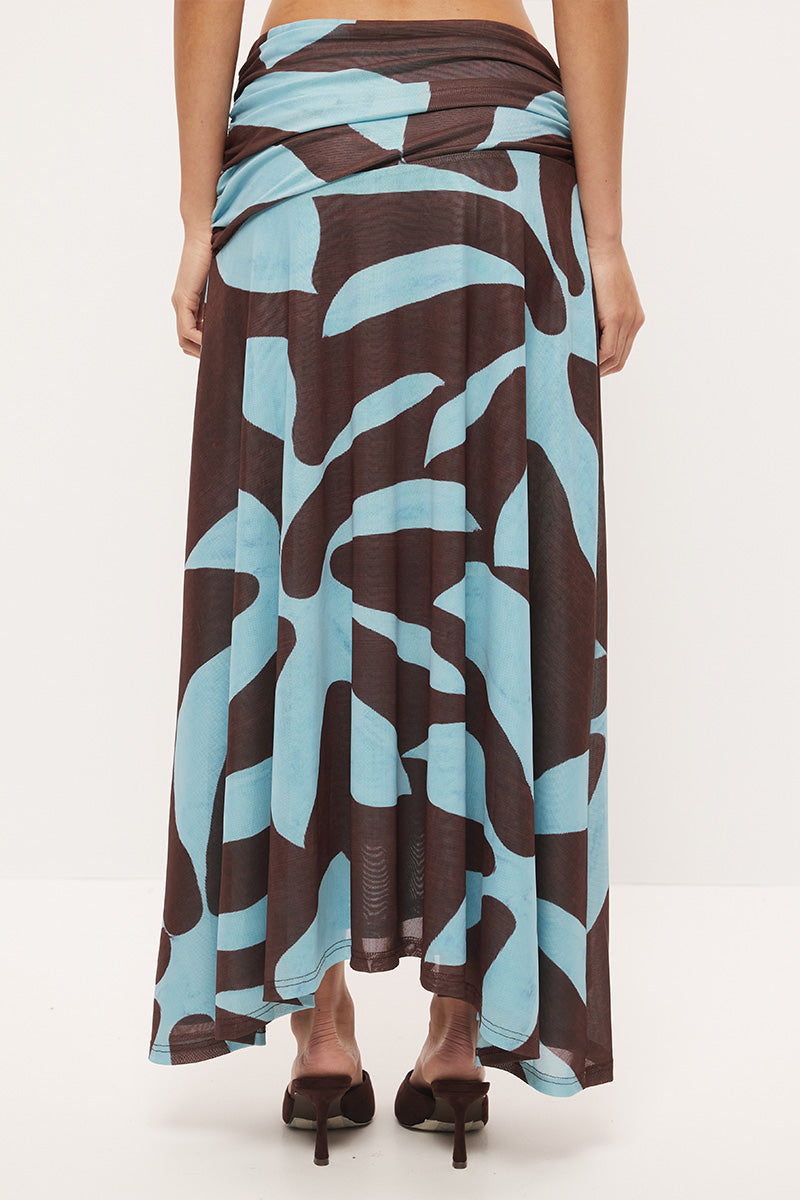 Mid-rise circle cut midi skirt in stretch mesh with asymmetrical gathered waistband and hi-lo hem in exclusive handcrafted print