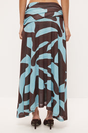 Mid-rise circle cut midi skirt in stretch mesh with asymmetrical gathered waistband and hi-lo hem in exclusive handcrafted print