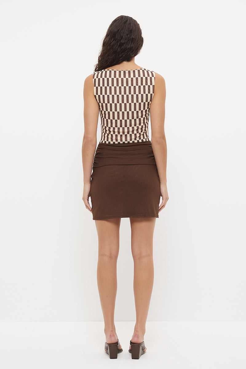 Bodycon mini dress with printed bodice, contrast sarong skirt and macrame tassel tie