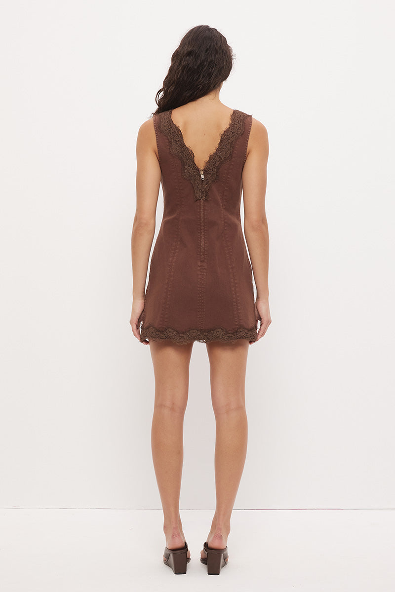 Sleeveless denim mini dress with V-neckline and scallop lace trim detail