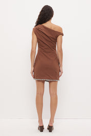 One-shoulder mini dress in textured stretch cotton with sunray pleats and fringed hem