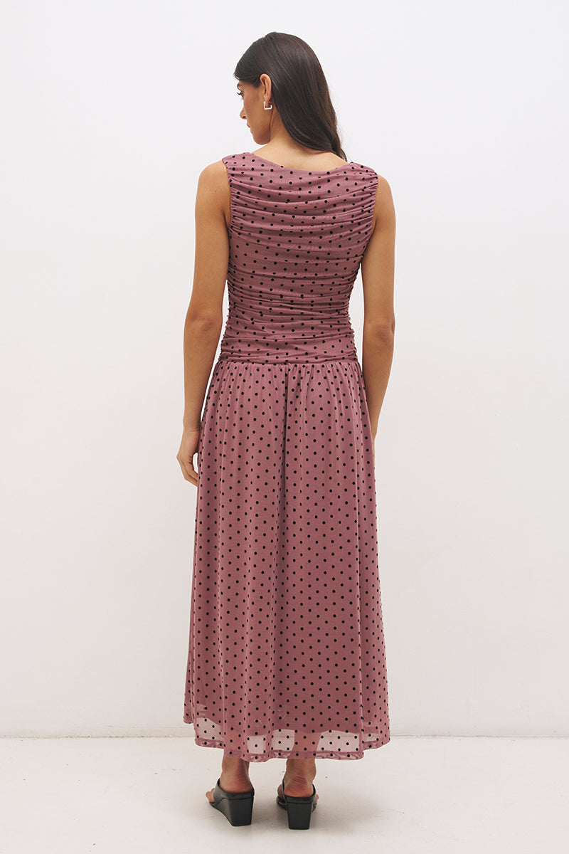 Sleeveless flocked polka dot mesh midi dress with ruched bodice, dropped waist, and fit and flare silhouette